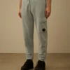 Joggingbyxor i bomullsfleece med diagonalstruktur och Lens-detalj