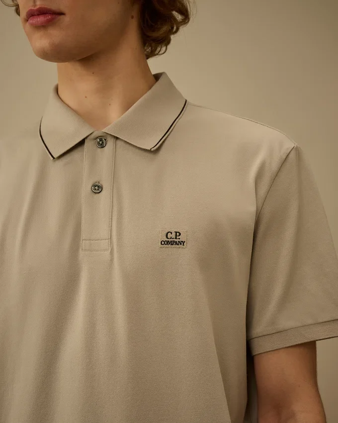 Kortärmad logopolo i stretchpiqué