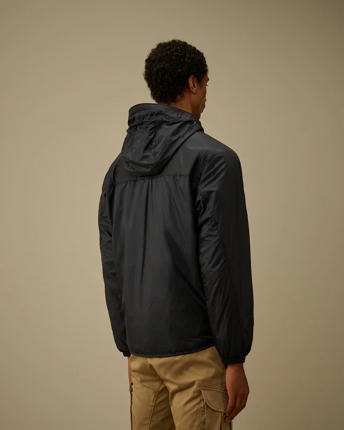 Nada Shield packbar Primaloft® Evolve-jacka med huva och Lens-detalj