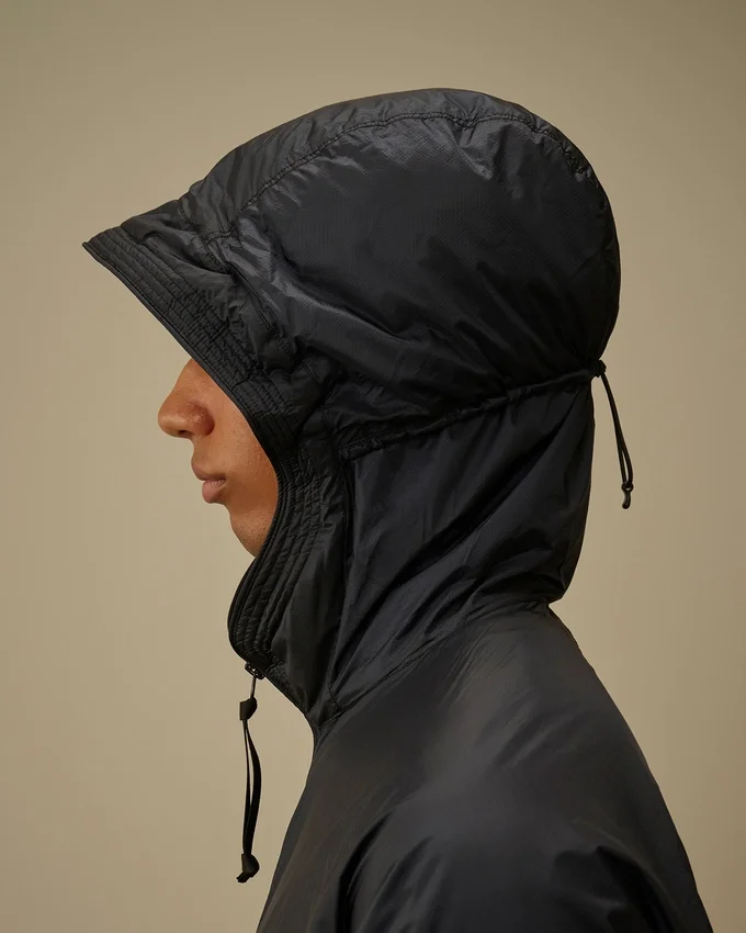 Nada Shield packbar Primaloft® Evolve-jacka med huva och Lens-detalj