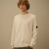 Raglan-tröja med rund hals i bomull/nylon