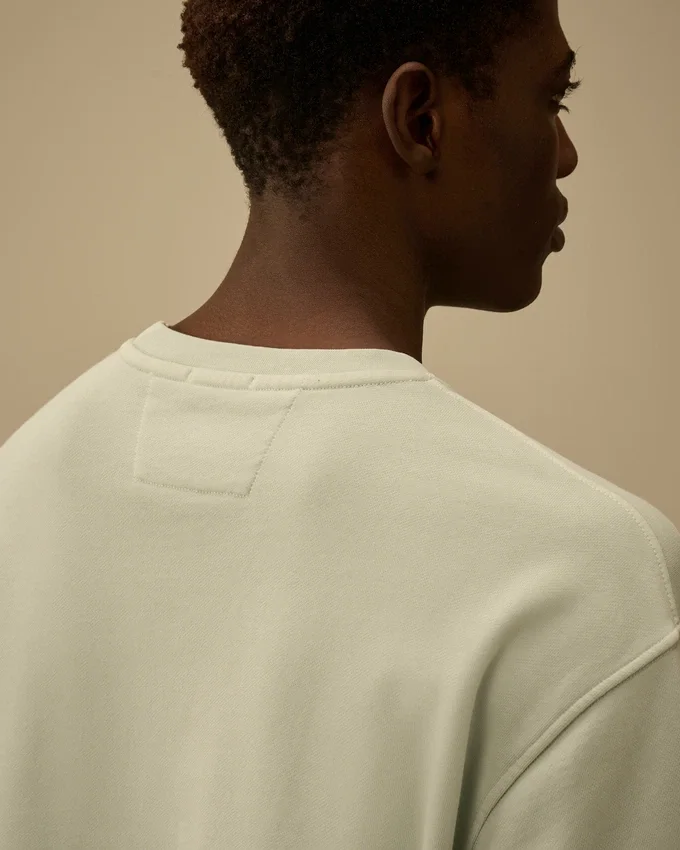 Tröja med rund hals, logotyp och resistfärgad diagonal bomullsfleece