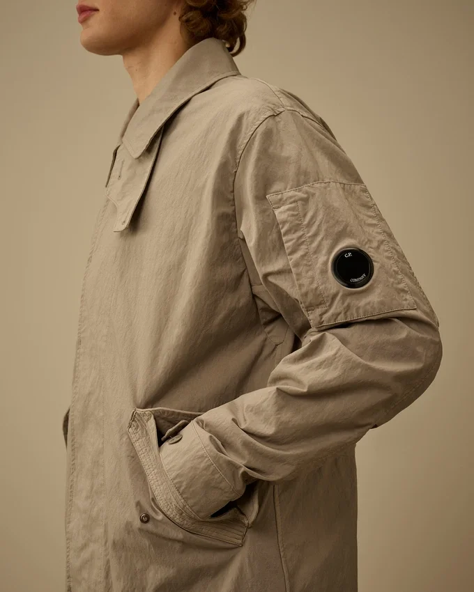 Twill-fishtail-kapp med Lens-detaljer