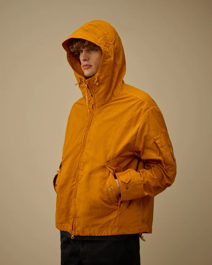 Twill-jacka med huva och skyddsglasögon