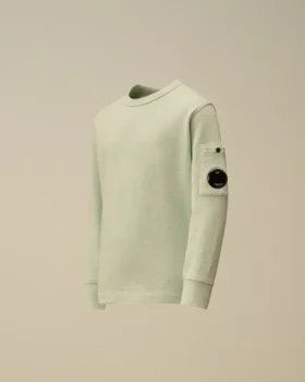 U16 Malfilè fleece-tröja med rund hals och Lens-motiv