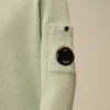U16 Malfilè fleece-tröja med rund hals och Lens-motiv