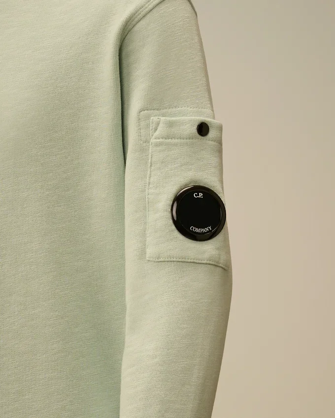 U16 Malfilè fleece-tröja med rund hals och Lens-motiv